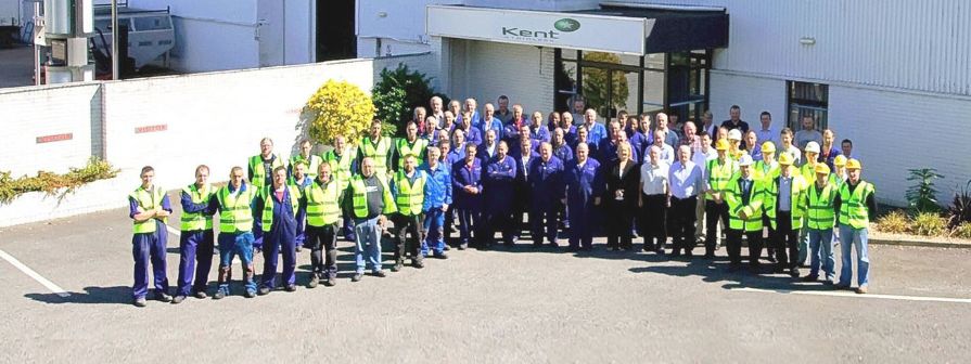 Photo of entire Kent team outside Kents factory